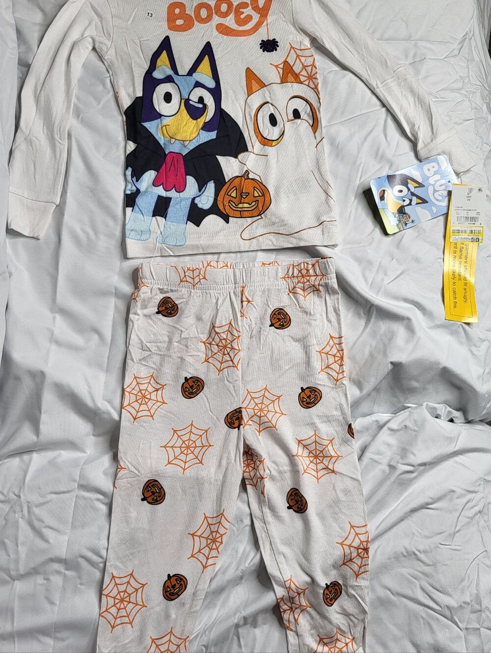 Bluey Halloween Pajama Set - White with Orange Pumpkin & Web Print